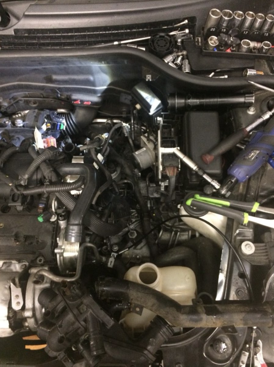 Everett mobile mechanic engine repair with tools laid out